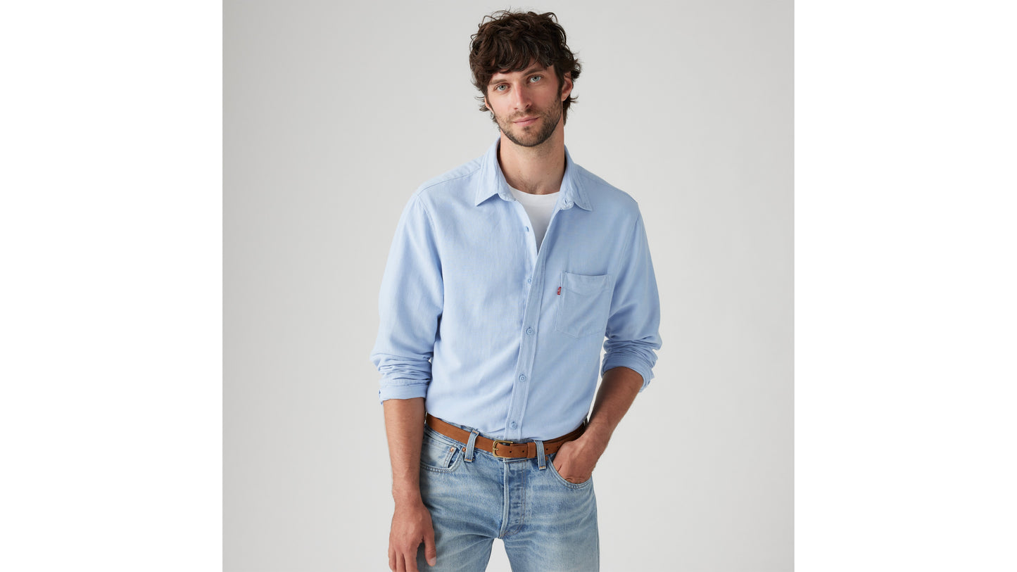 Man in Levi's light-blue shirt and denim jeans with belt