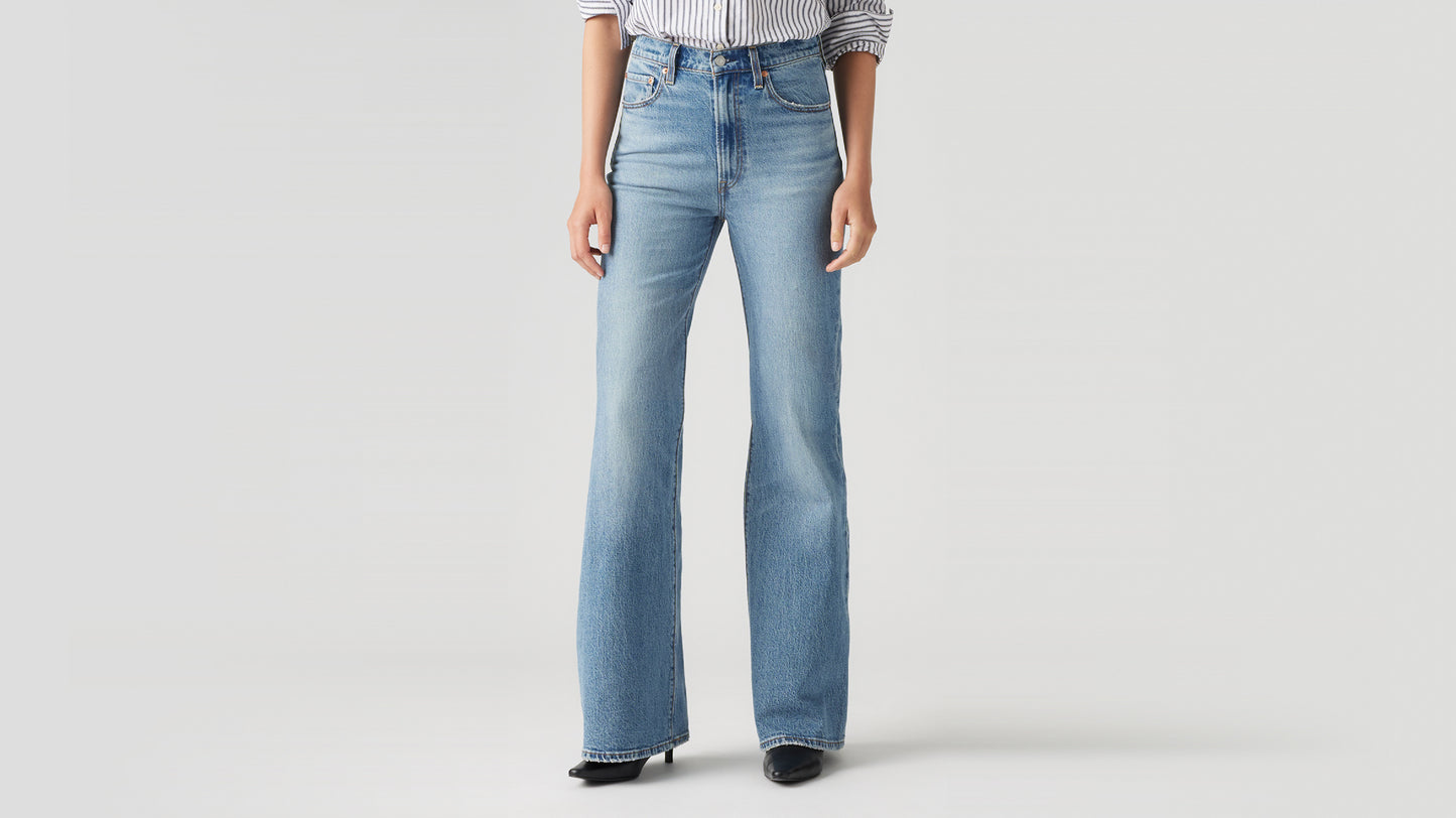 Levi’s light blue high-waisted flared jeans with heels