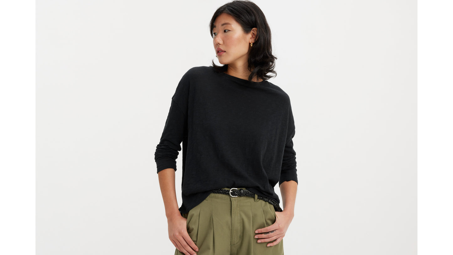 Levi's black long-sleeve top with olive pleated pants