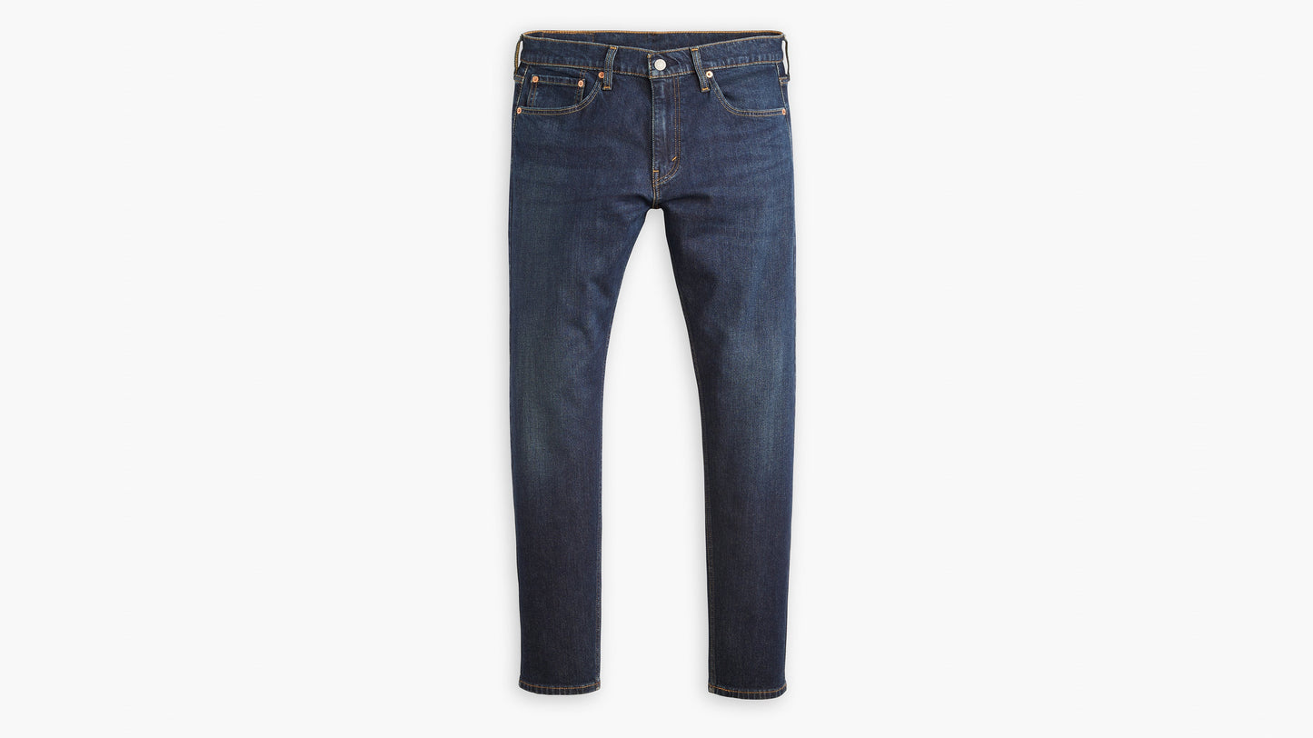 Product shot of Levi’s blue 512 jeans, featuring a clean front design & fit