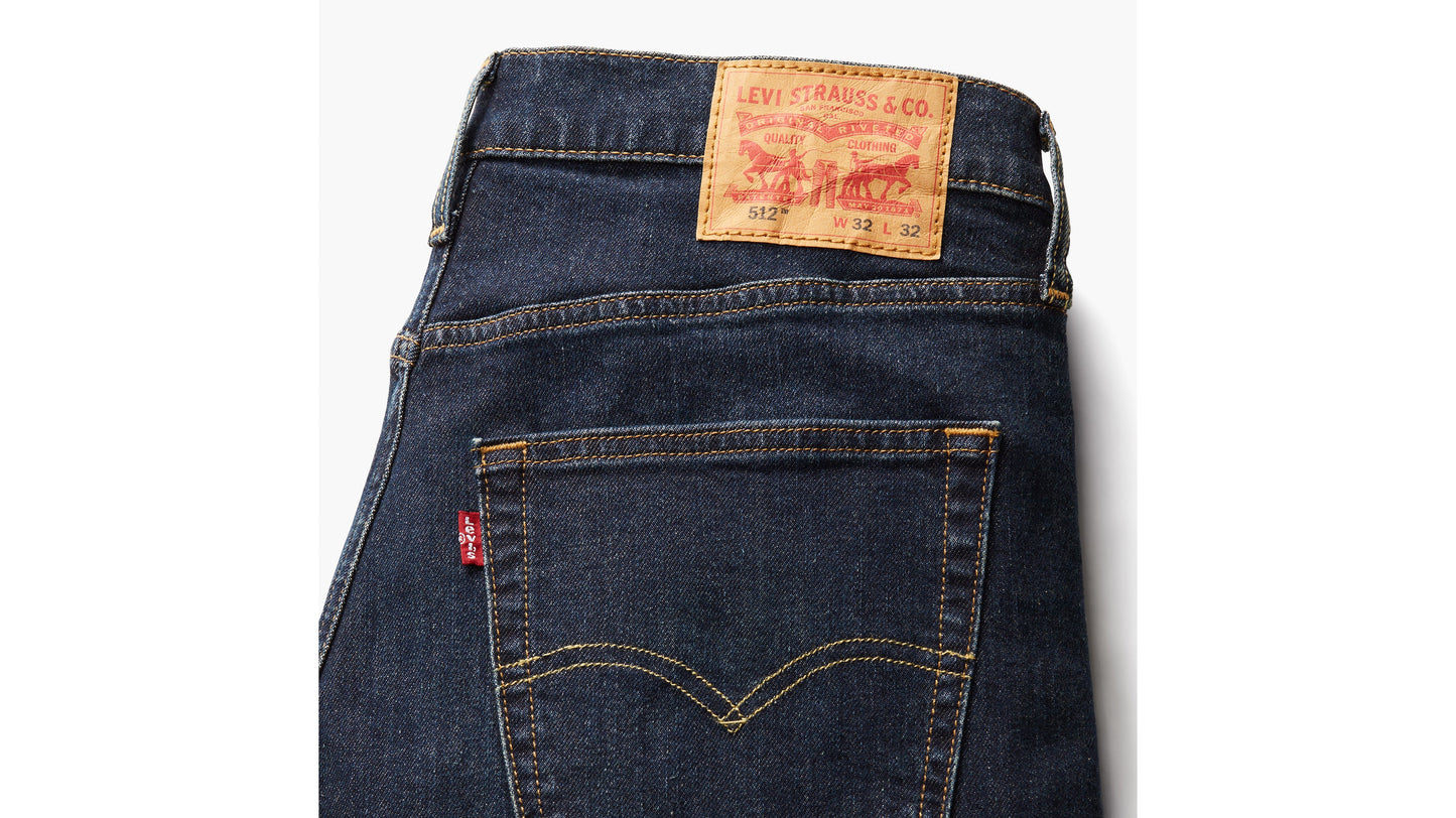 Close-up of Levi’s 512 slim jeans, showcasing the red tag, back pocket & stitching