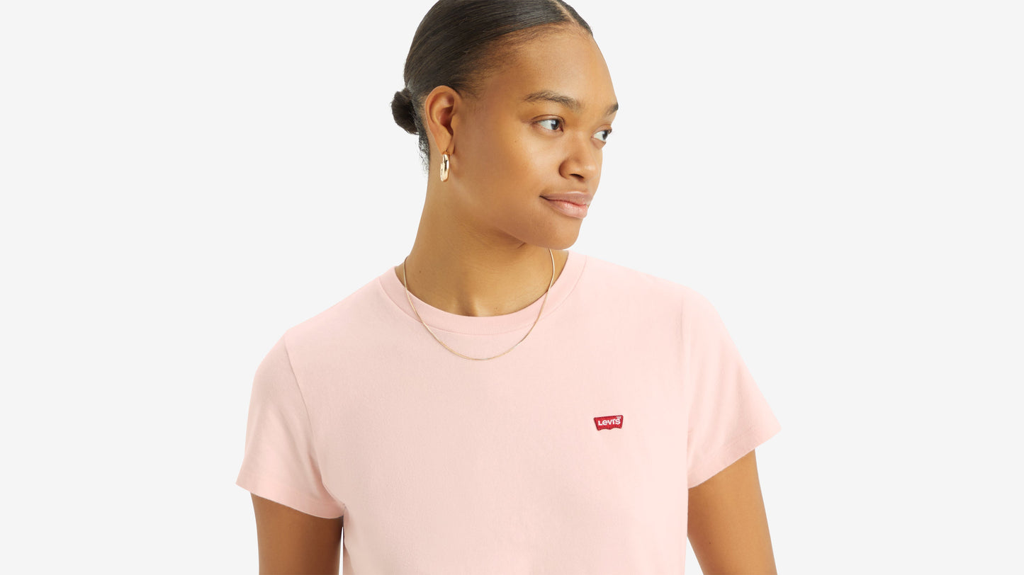 Close-up of woman in pink Levi’s t-shirt
