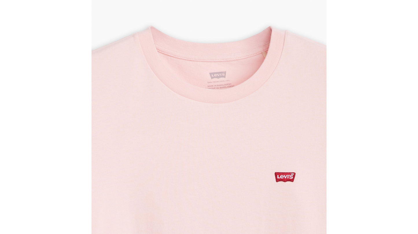 Close-up of Levi’s logo on pink t-shirt