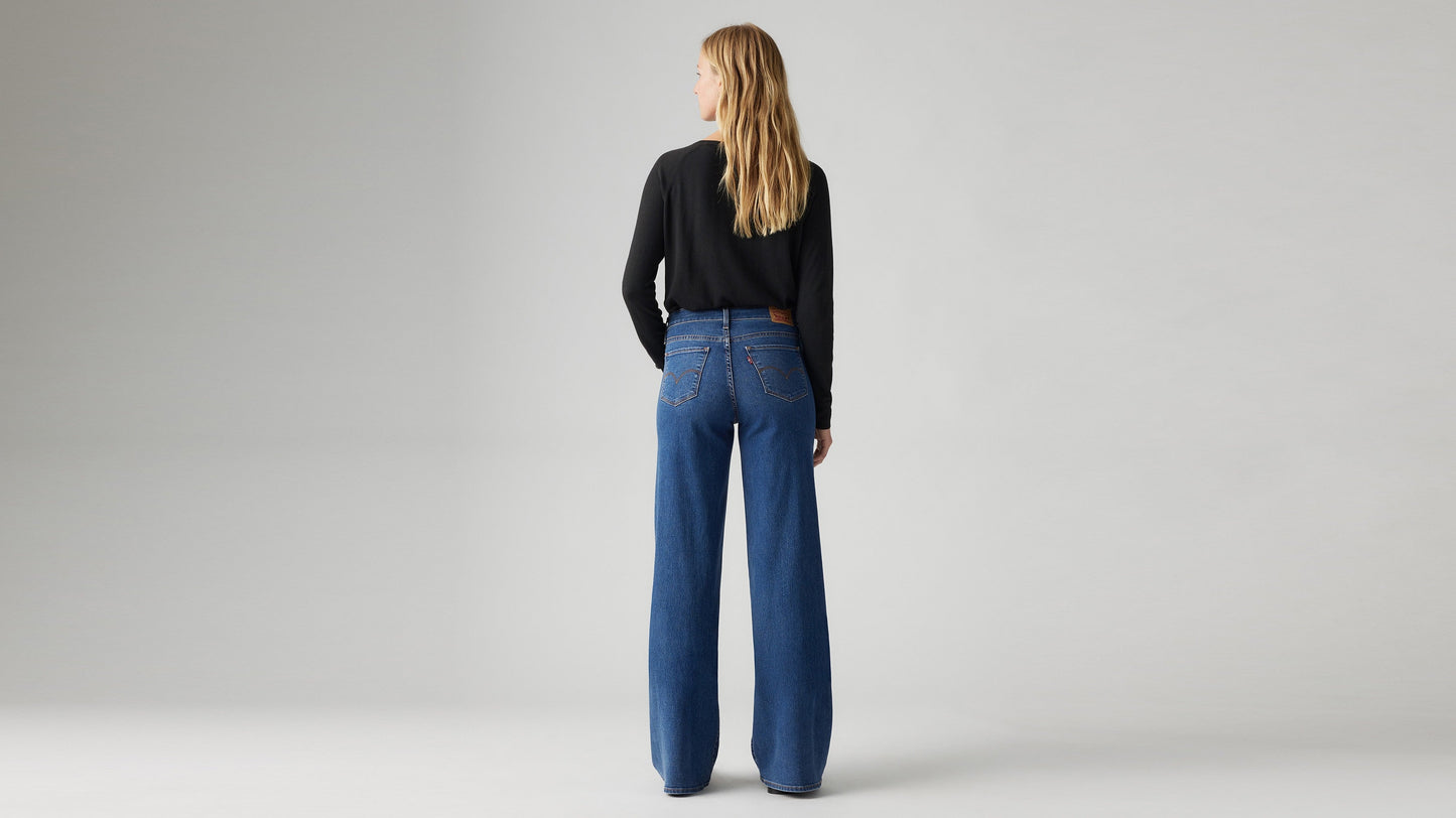 Model wearing Levi's women's jeans, back view