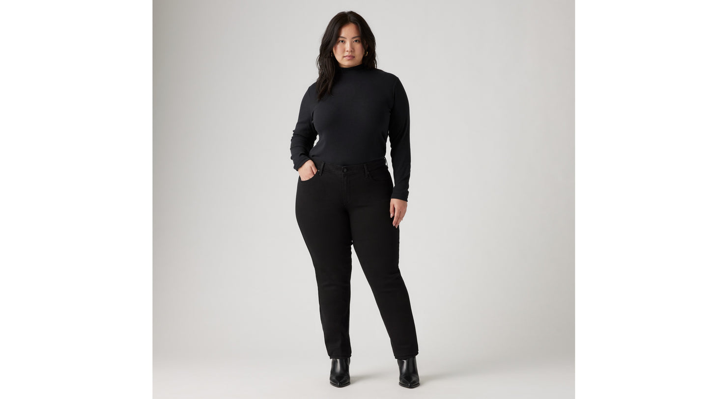 Woman in black jeans and black long sleeves