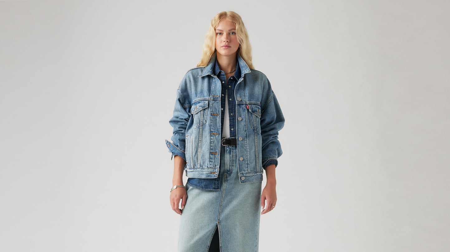 Woman wearing oversized Levi's denim jacket and skirt