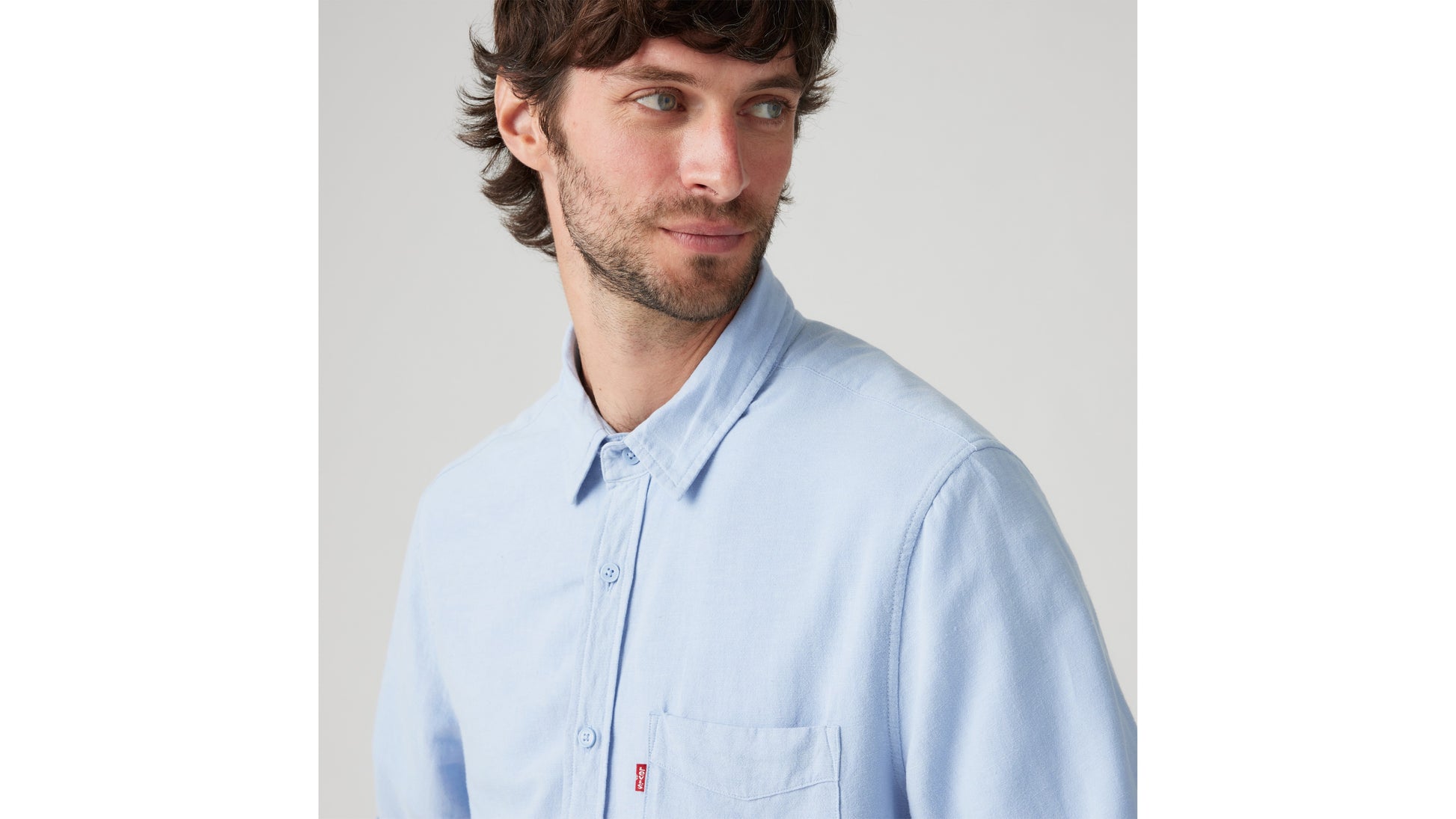 Close-up of man in Levi's light blue shirt with pocket