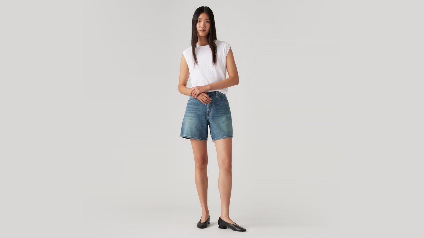 Levi's high-waisted women's denim shorts and white tank