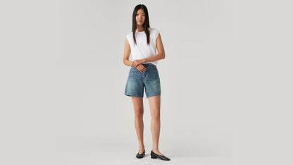 Levi's high-waisted women's denim shorts and white tank