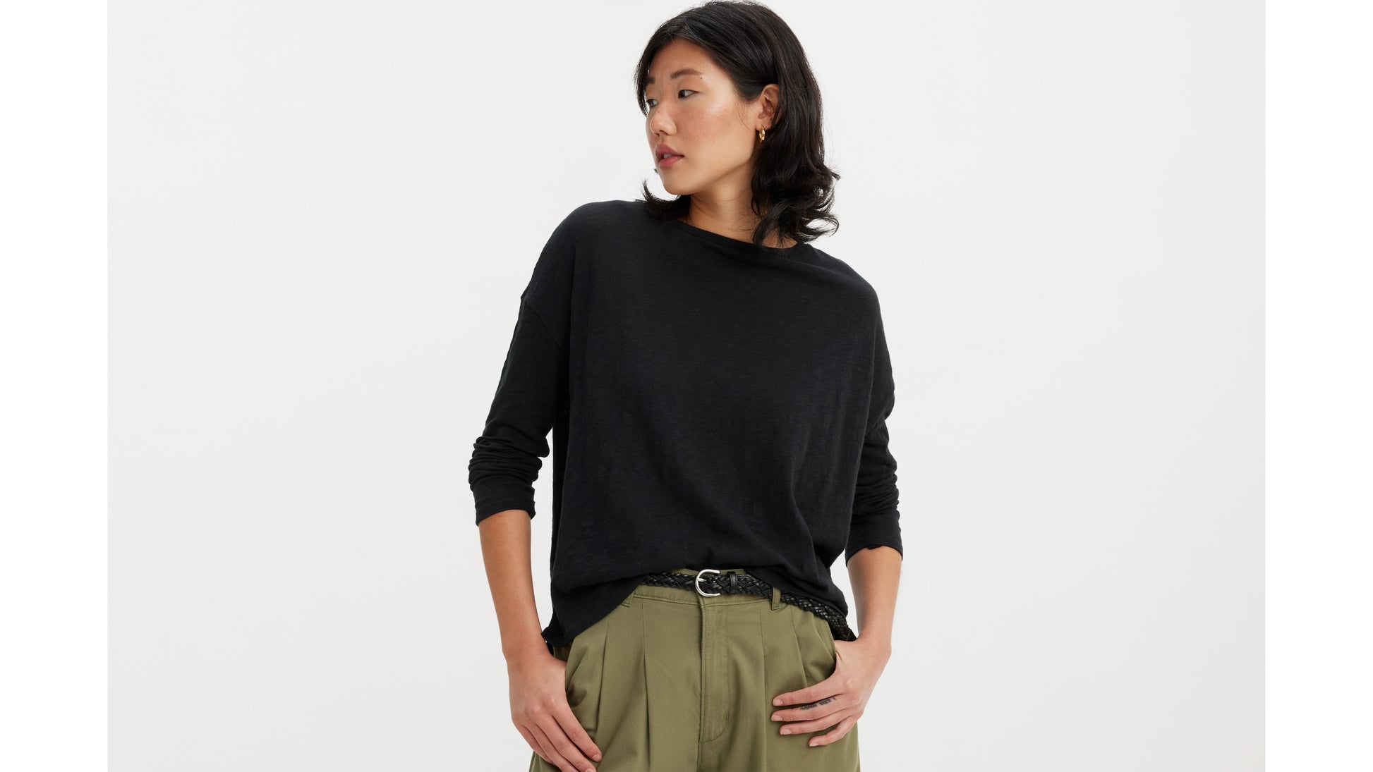 Levi's black long-sleeve top with olive pleated pants