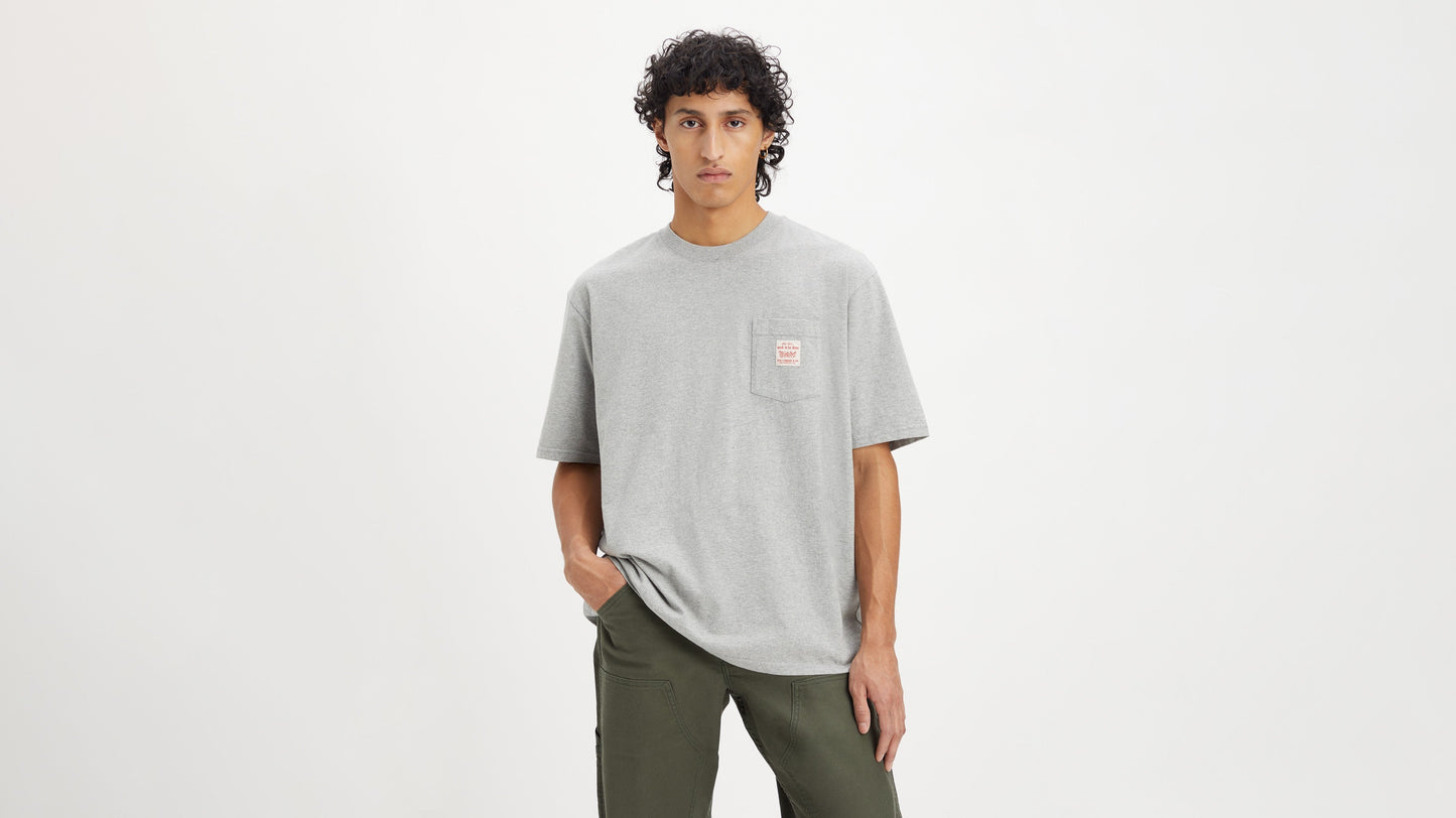 Model in Levi's mens gray short sleeve workwear shirt fron view
