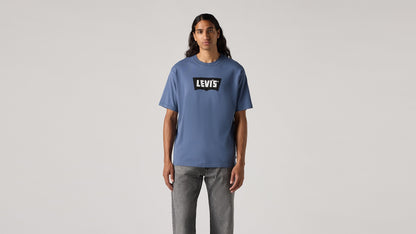 Model in Levi's mens blue round neck tee shirt