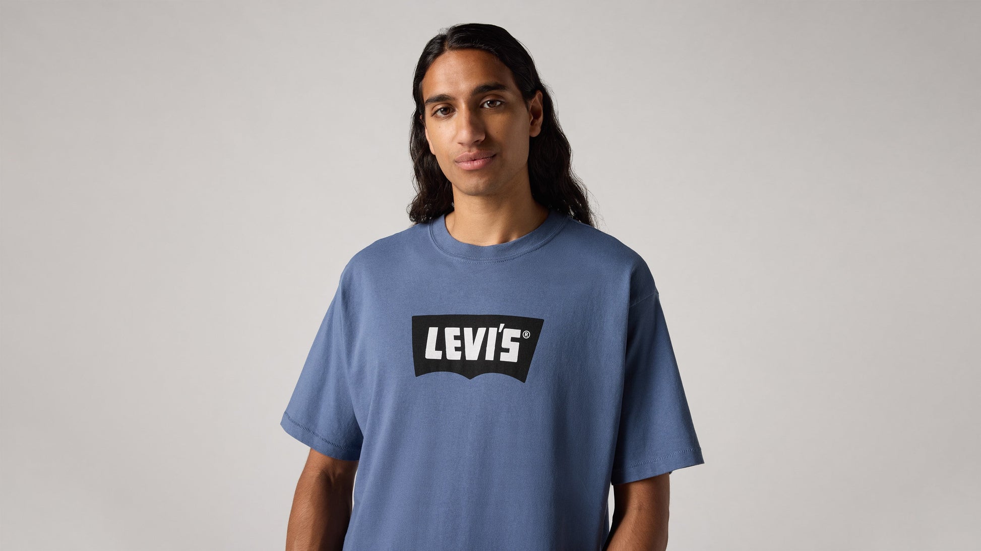 Man wearing blue round neck tshirt close-up view