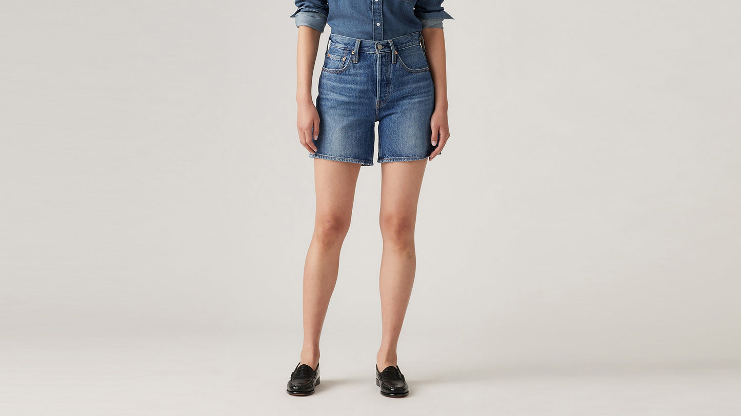 Close up view Levi's blue mid thigh shorts